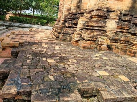 Close-up of the tower's base eroded by weather over more than 1,300 years