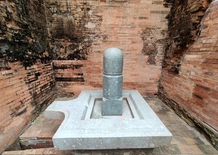 Linga and Yoni stone set symbolizing yin and yang, heaven and earth in the ancient tower.